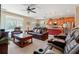 Open-concept living space with a blend of relaxation and kitchen views at 10617 Lucaya Dr, Tampa, FL 33647