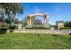 Community sign for WatersEdge with stone base and manicured lawn at 11833 Castine St, New Port Richey, FL 34654