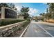 Welcoming entrance to Ventana at WatersEdge with stone and monument sign at 11833 Castine St, New Port Richey, FL 34654