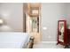 Bright bedroom features a long hallway with a tall ceiling and ample storage, creating a cozy and inviting space at 12322 Hawkeye Point Pl, Riverview, FL 33578