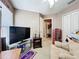 Bedroom with TV and doorway at 12322 Hawkeye Point Pl, Riverview, FL 33578