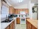 Bright kitchen with ample countertop space, built-in appliances, and lots of storage for easy organization at 12322 Hawkeye Point Pl, Riverview, FL 33578