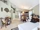 Inviting living space showcases a dining set, china cabinet, and tasteful decor, perfect for entertaining at 12322 Hawkeye Point Pl, Riverview, FL 33578