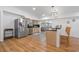 Modern kitchen with stainless steel appliances, granite countertops, and ample cabinet space at 12384 144Th St, Largo, FL 33774