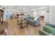 Bright and airy living room showcasing an open layout and seamless flow to the kitchen at 12384 144Th St, Largo, FL 33774