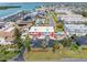 Aerial view showcasing the condo's location near the water and community pool at 12485 2Nd E St # C103, Treasure Island, FL 33706