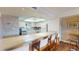 Modern kitchen with a long bar and plenty of natural light at 12485 2Nd E St # C103, Treasure Island, FL 33706