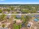 Large property with a pool, shed and surrounding trees, offering privacy and outdoor space at 13193 Paxton Ave, Weeki Wachee, FL 34614