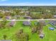 Large property with a pool, shed and surrounding trees, offering privacy and outdoor space at 13193 Paxton Ave, Weeki Wachee, FL 34614