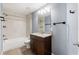 Bathroom featuring modern fixtures, vanity, and tub at 13193 Paxton Ave, Weeki Wachee, FL 34614