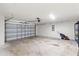 Spacious garage with an automatic door at 13193 Paxton Ave, Weeki Wachee, FL 34614
