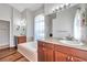 Bright bathroom with dual vanity sinks, a soaking tub, and tile flooring at 13290 Don Loop, Spring Hill, FL 34609