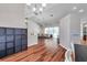 Bright open-plan living room showing access to the lanai at 13290 Don Loop, Spring Hill, FL 34609