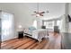 Spacious main bedroom with vaulted ceiling, ceiling fan, and hardwood floors at 13290 Don Loop, Spring Hill, FL 34609