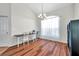 Office with a large window, modern lighting, and wood-look flooring at 13290 Don Loop, Spring Hill, FL 34609