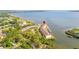 Aerial view of the condo complex offering beautiful waterfront views, boat docks, and easy water access at 140 Brent Cir, Oldsmar, FL 34677