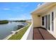 Stunning balcony view overlooking the waterway and boat docks on a bright, sunny day at 140 Brent Cir, Oldsmar, FL 34677