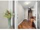 Inviting foyer with hardwood floors, staircase, and decorative accents at 140 Brent Cir, Oldsmar, FL 34677