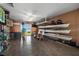 Spacious garage featuring kayak storage and water access at 140 Brent Cir, Oldsmar, FL 34677