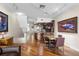 Inviting living room with hardwood floors and view of the kitchen at 140 Brent Cir, Oldsmar, FL 34677