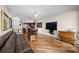 Comfortable living room with a view of the kitchen and stylish decor at 140 Brent Cir, Oldsmar, FL 34677