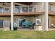 Cozy waterfront patio area with comfortable seating and outdoor amenities at 140 Brent Cir, Oldsmar, FL 34677