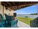 Enjoy waterfront views from this relaxing patio with outdoor seating at 140 Brent Cir, Oldsmar, FL 34677