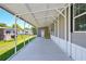Spacious covered carport area perfect for parking and outdoor activities at 14383 Dehaven Ave, Brooksville, FL 34613
