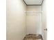 The walk-in closet features wood-style floors and a wire shelving unit at 14383 Dehaven Ave, Brooksville, FL 34613