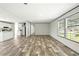 Open living space featuring modern flooring, stainless appliances and an open floor plan at 14383 Dehaven Ave, Brooksville, FL 34613