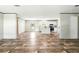 Open living space featuring modern flooring, stainless appliances and natural light at 14383 Dehaven Ave, Brooksville, FL 34613