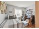 Cozy bedroom with a striped comforter, neutral walls, and natural light perfect for relaxing at 1511 Woonsocket Ln, Brandon, FL 33511