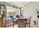 Cozy dining room featuring a large window and plenty of natural light at 1511 Woonsocket Ln, Brandon, FL 33511
