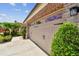 Close-up of a well maintained two-car garage door with brick accents and landscaping at 1511 Woonsocket Ln, Brandon, FL 33511