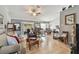 Large, open-concept living room features lots of seating and a smooth tile floor at 1511 Woonsocket Ln, Brandon, FL 33511