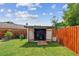 A well-organized storage shed in the backyard, perfect for gardening tools and equipment at 1511 Woonsocket Ln, Brandon, FL 33511