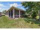 Spacious back yard with screen enclosed lanai allows for quiet enjoyment and entertaining at 16055 Golden Lakes Dr, Wimauma, FL 33598