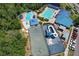 Community amenities showcasing a pool, basketball court, and recreation center for diverse activities and entertainment at 1624 Maximilian Dr, Wesley Chapel, FL 33543