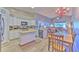 Bright kitchen with white cabinets, stainless steel appliances, and center island at 1624 Maximilian Dr, Wesley Chapel, FL 33543