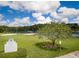 Community park and recreational area with park policies sign, offering residents a space for outdoor activities at 1624 Maximilian Dr, Wesley Chapel, FL 33543
