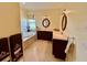 Bathroom with double vanity, mirrors, and a luxurious soaking tub at 17127 Brown Rd, Odessa, FL 33556