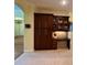 Built-in brown cabinets with desk area and drawers offer ample storage and workspace at 17127 Brown Rd, Odessa, FL 33556