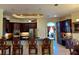Open floor plan kitchen and dining area with island seating at 17127 Brown Rd, Odessa, FL 33556