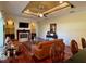 Bright living room featuring a fireplace, recessed ceilings, and hardwood flooring at 17127 Brown Rd, Odessa, FL 33556