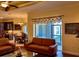 Comfortable living room featuring hardwood floors and natural light at 17127 Brown Rd, Odessa, FL 33556