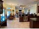 Open concept kitchen and dining area with living area in background at 17127 Brown Rd, Odessa, FL 33556
