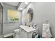 Clean bathroom with a vanity, toilet, and a large mirror at 1751 Ashton Abbey Rd, Clearwater, FL 33755