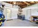 Spacious garage featuring a washer and dryer, and storage shelves for organized utility space at 1751 Ashton Abbey Rd, Clearwater, FL 33755