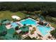 Community amenities include a pool, slide, clubhouse, sports courts, and baseball field at 19116 Nature Palm Ln, Tampa, FL 33647
