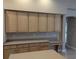 Kitchen with an abundance of cabinets and countertop space at 19116 Nature Palm Ln, Tampa, FL 33647
